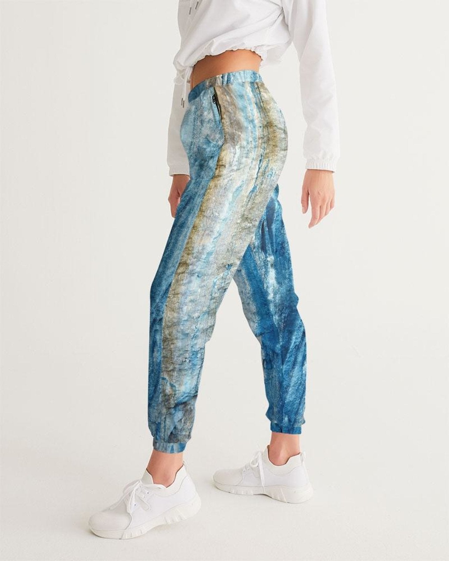 Elevate your style with comfortable and stylish women's track pants. Perfect for staying active and fashionable. Shop now!