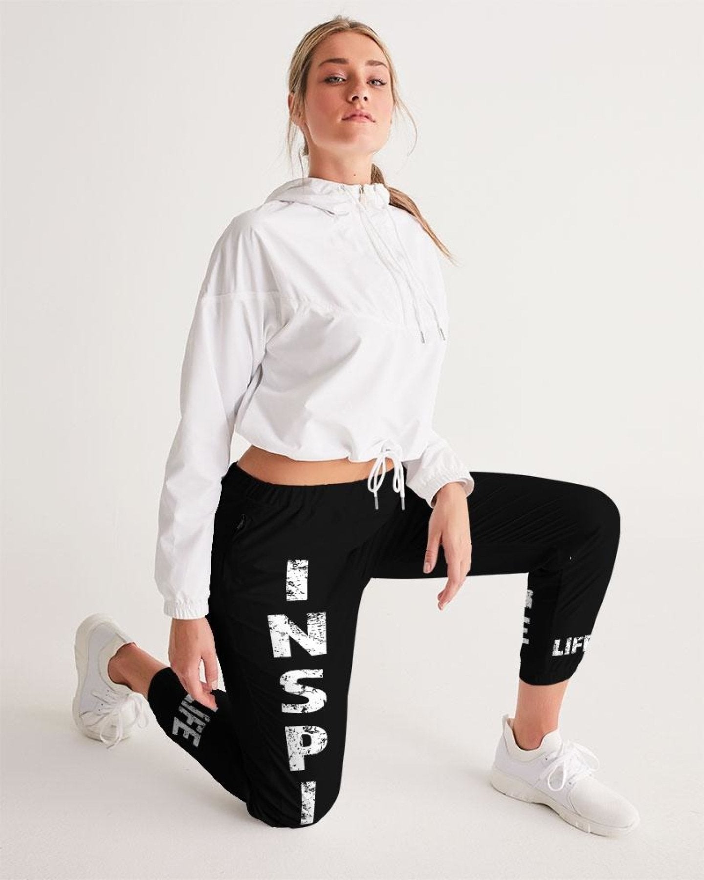 Elevate your active wardrobe with our stylish Liz Track Pants for women. Discover comfort and performance in our women's track pants designed to keep you moving.