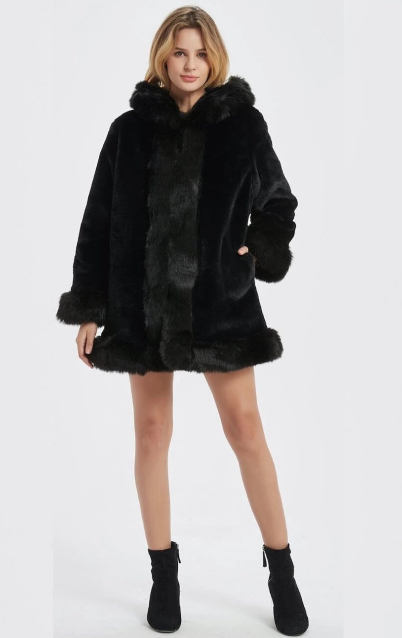 Stay glamorous and warm with our faux fur coat, a stylish choice for colder days.